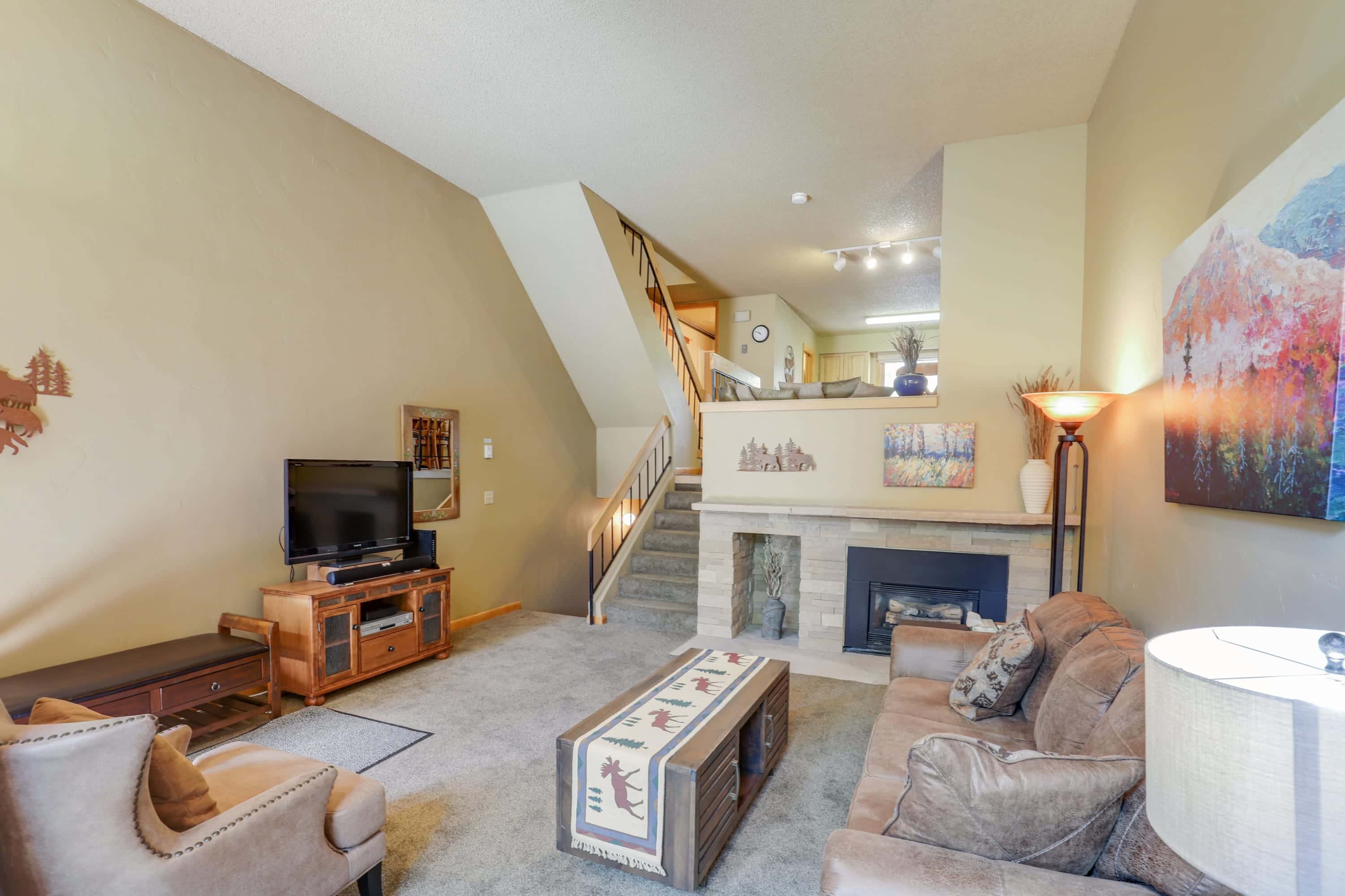 Living room with gas fireplace and flat screen TV